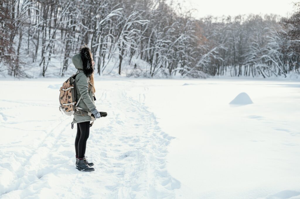 Side View Woman With Backpack Winter Day 1024x681